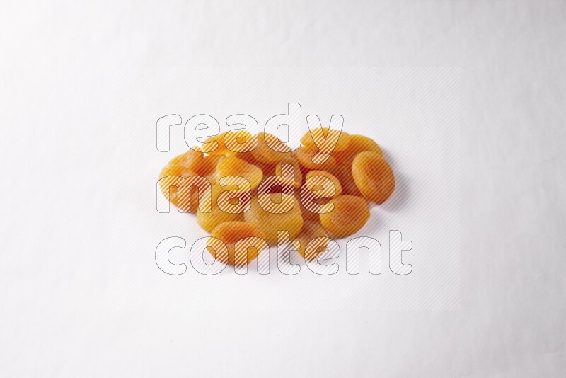Dried apricots on white background