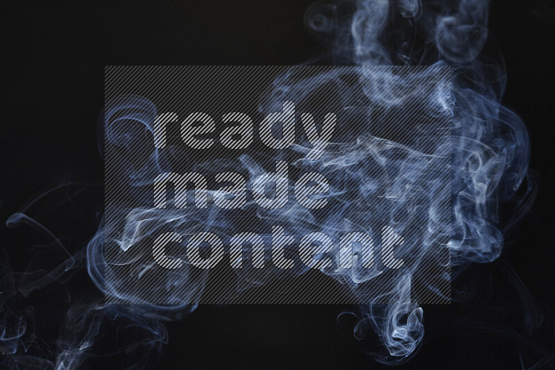 Motion of wavy smoke isolated on dark background