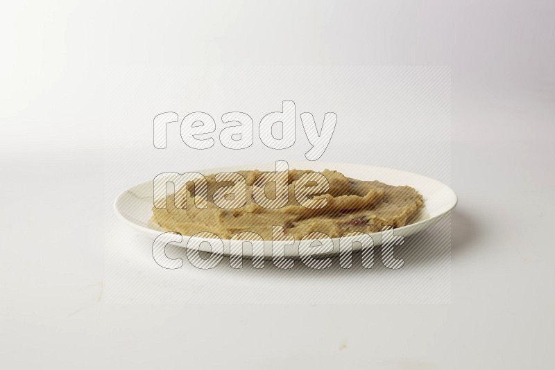 fava bean in a white plate direct on a white background
