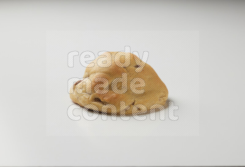a chocolate chip cookie on a white background