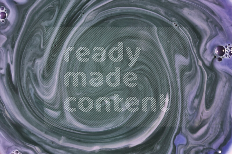 A close-up of abstract swirling patterns in blue, pink and green