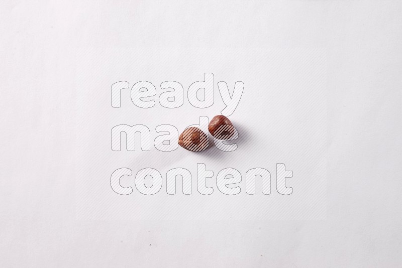 Hazelnuts on white background