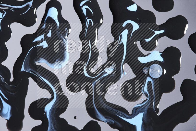 Abstract colorful background with mixed of blue and black paint colors