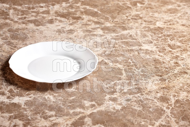 White Ceramic Circular Plate on Beige Marble Flooring, 45 degrees