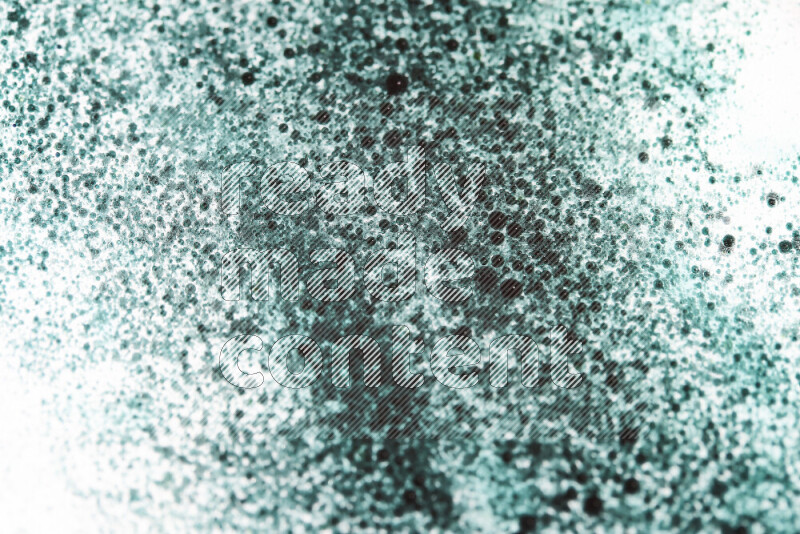 Close-ups of abstract green watercolor drops on oil Surface on white background