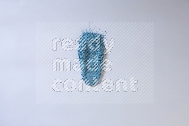 Blue powder strokes on white background