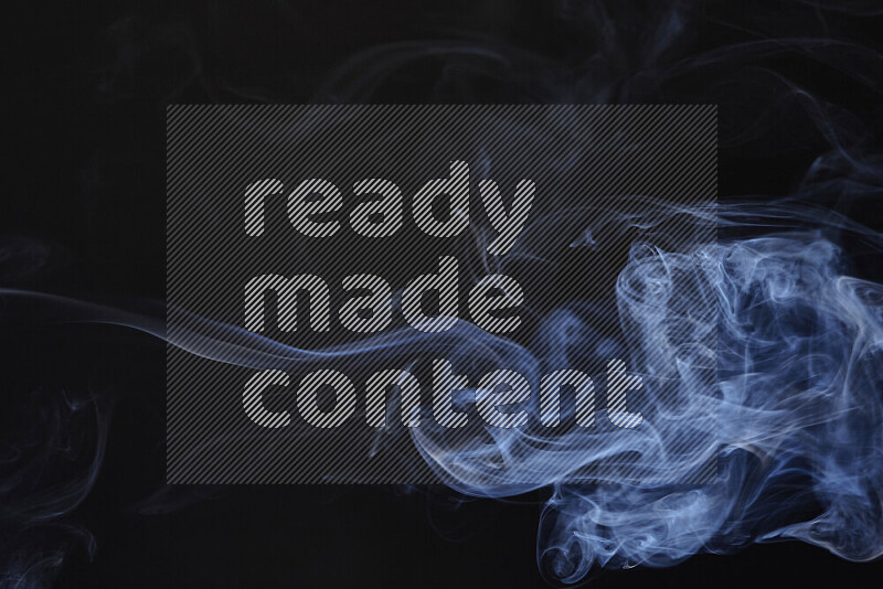 Motion of wavy smoke isolated on dark background