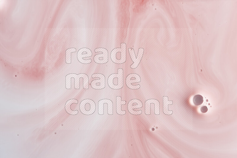 A close-up of abstract swirling patterns in red and white