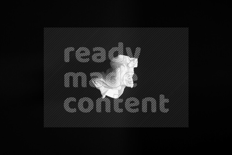 White plastic textures on black background