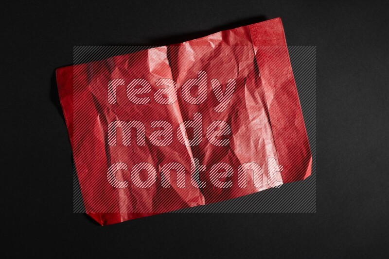 Colored plastic textures on black background