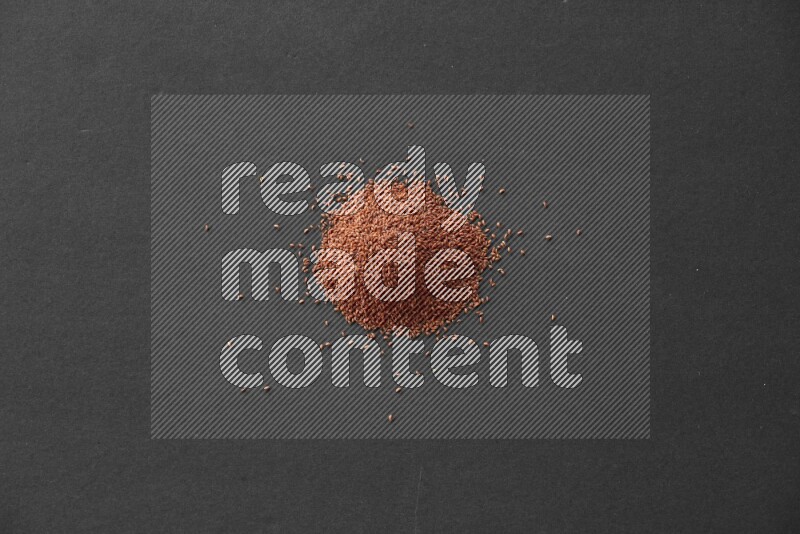 Garden cress on a black flooring