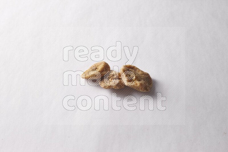 Dried figs on white background