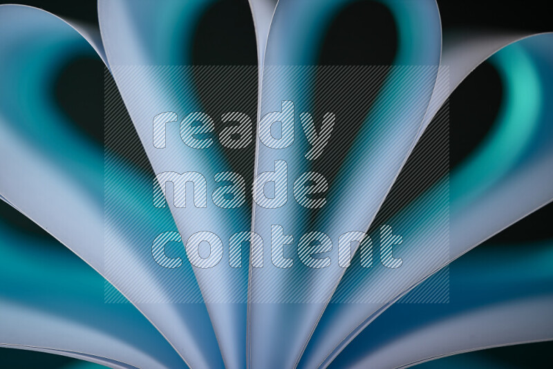 An abstract art piece displaying smooth curves in white and blue gradients created by colored light