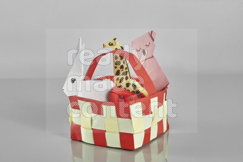 Origami animals on grey background