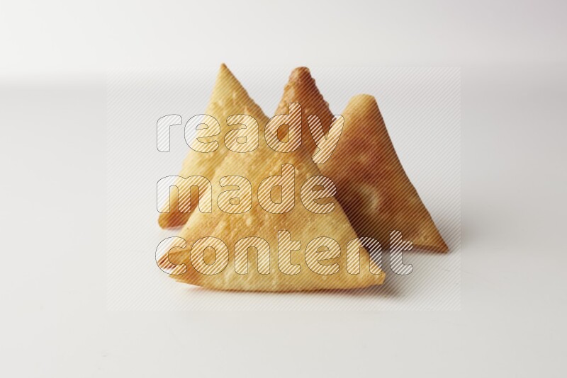 sambosas on a white background