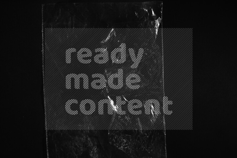 Transparent plastic textures on black background