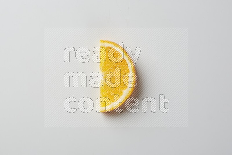 An orange half slice on white background