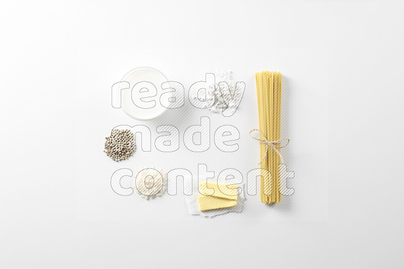 White sauce pasta recipes ingredients on white background