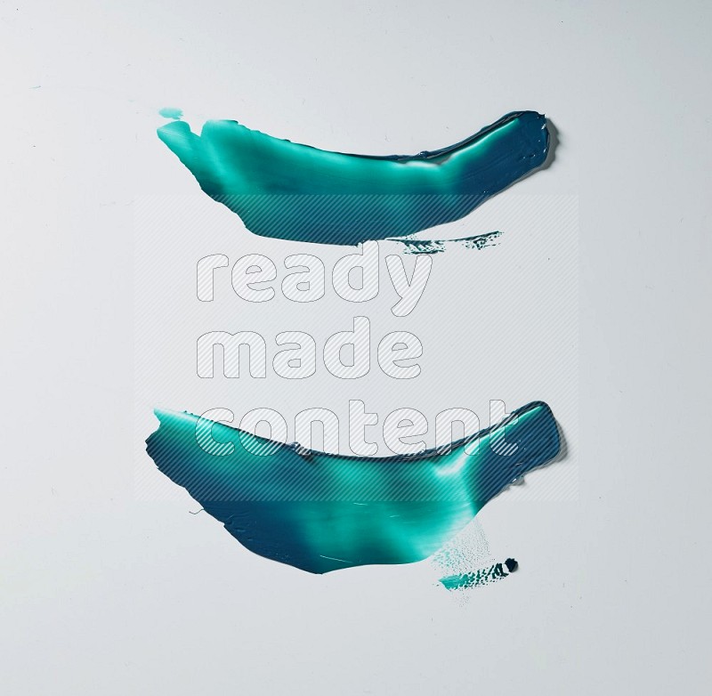 Turquoise curved painting knife strokes on white background