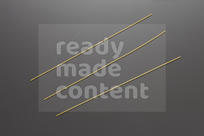Spaghetti pasta on grey background