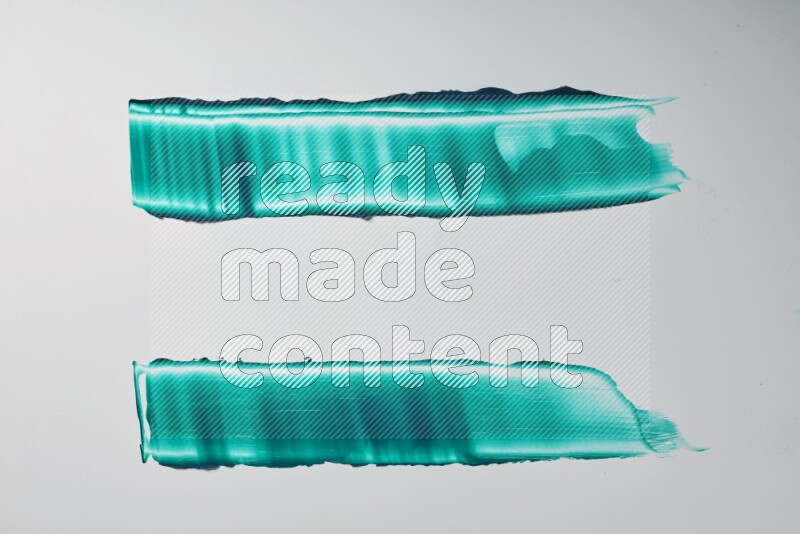 Turquoise painting knife strokes on white background