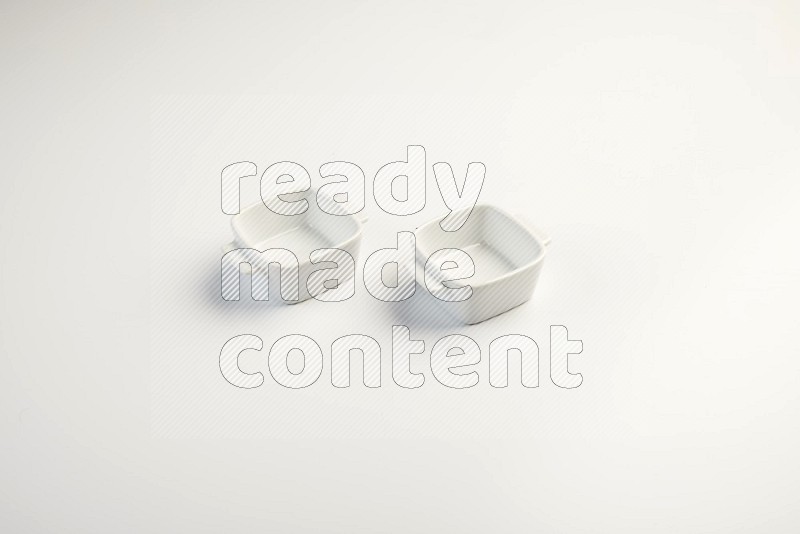 white ceramic square sauce dish on white countertop