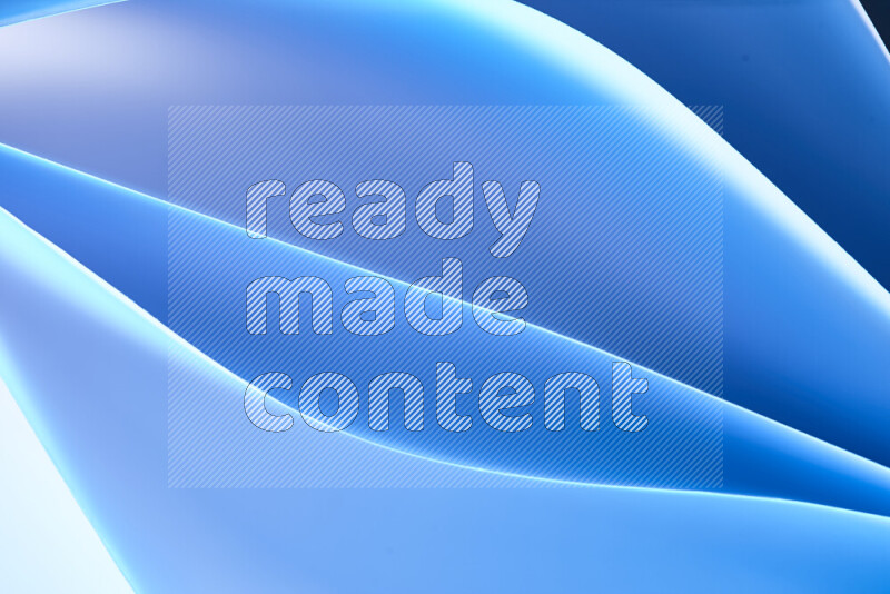 هذه الصورة تعرض تكوين فن الورق التجريدي مع منحنيات ورقية بتدرجات اللون الأزرق المكونه بواسطة الضوء الملون