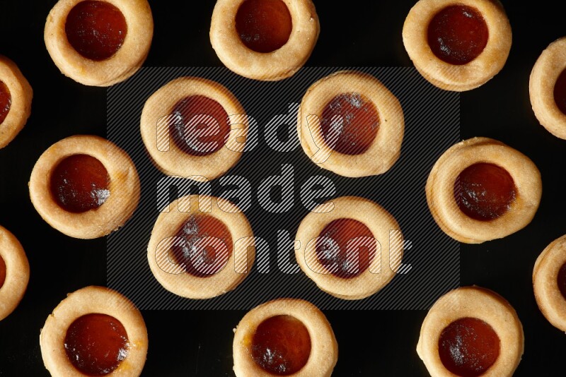 Jam cookies on a black background