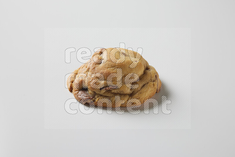 a chocolate chip cookie on a white background