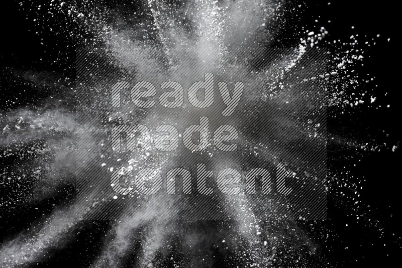 White powder explosion on black background