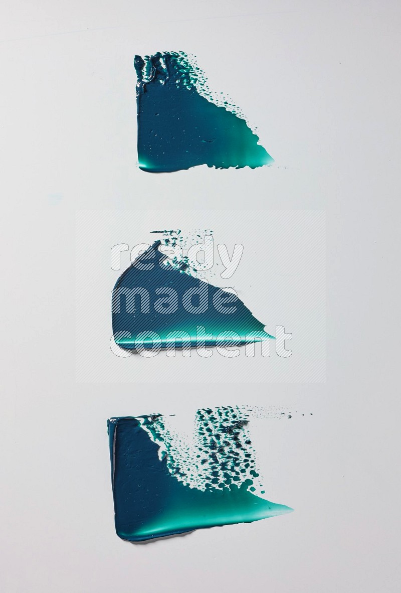 Turquoise painting knife strokes in on white background