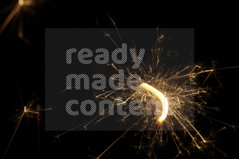 Sparkler candle isolated on black background