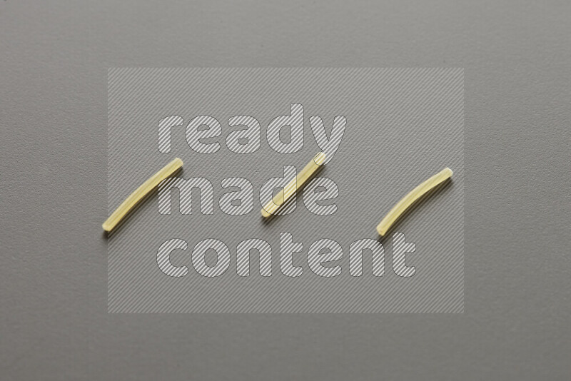 Vermicelli pasta on grey background