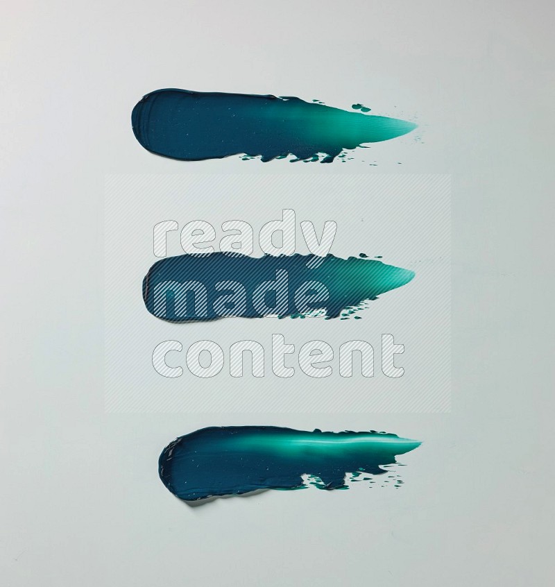 Turquoise painting knife strokes on white background