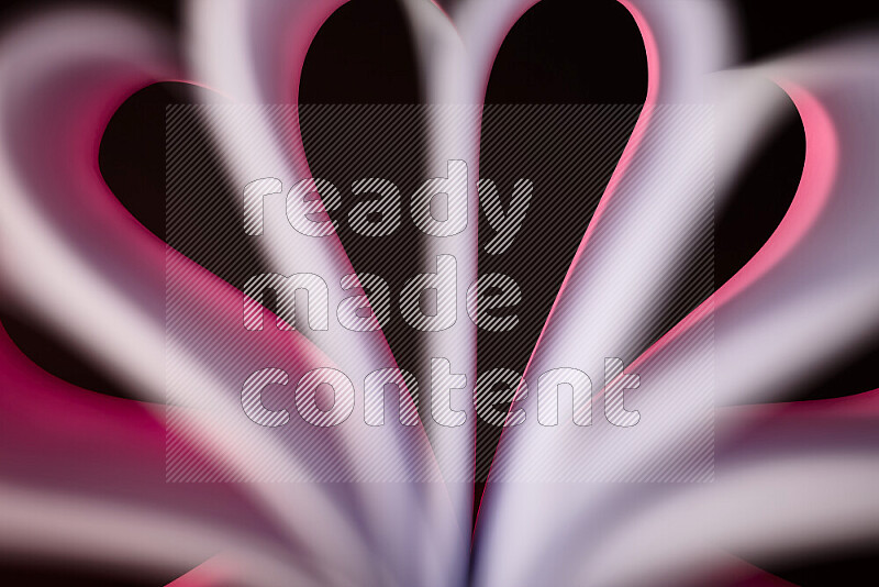 An abstract art piece displaying smooth curves in pink gradients created by colored light