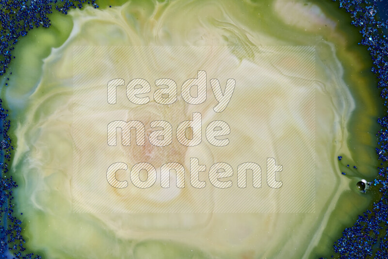 لقطة مقربة لبريق أزرق متلألئ منتشر على خلفية من اللون الأزرق والأخضر في حركات دائرية