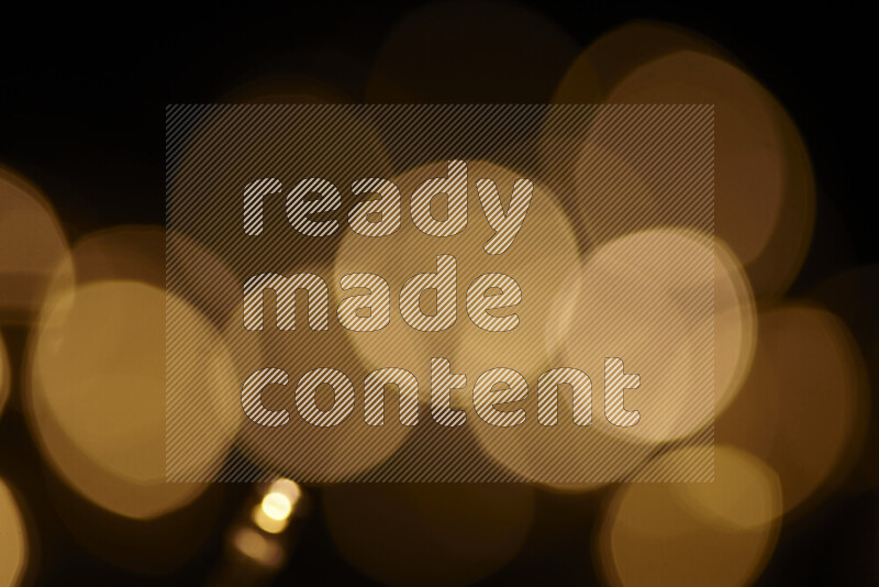 مصابيح ذهبية علي خلفية سوداء