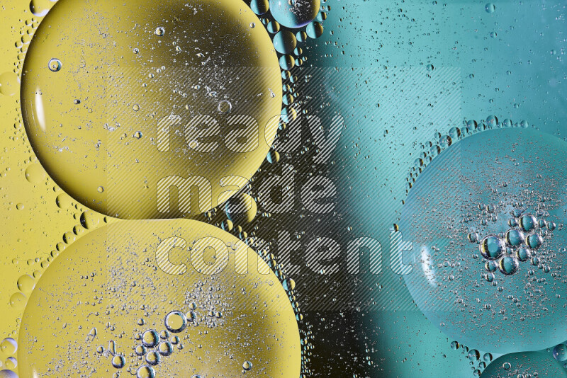 Close-ups of abstract oil bubbles on water surface in shades of green and yellow