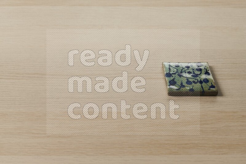 قواعد أكواب مزخرفة على خلفية خشبية فاتحة