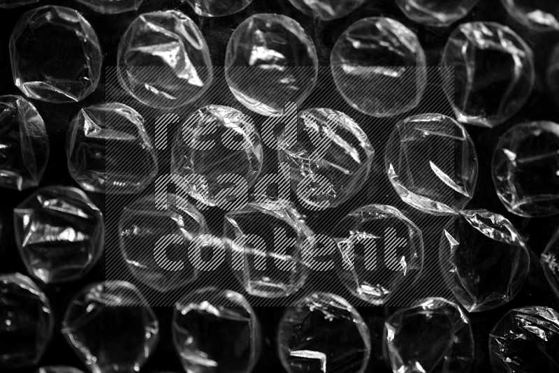 Bubble wrap texture on black background