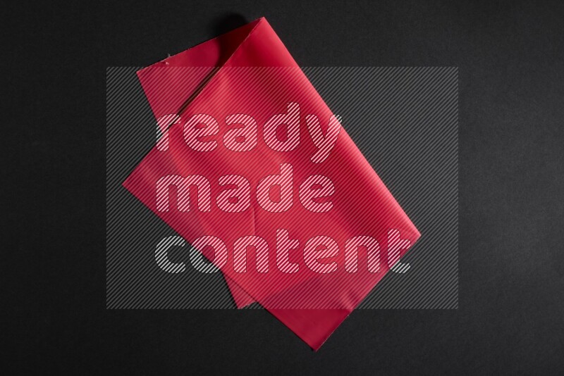 Colored plastic textures on black background