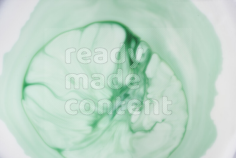 لقطة مقربة لأنماط دوامية بتدرجات اللون الأخضر