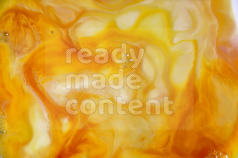 A close-up of abstract different swirling patterns in orange