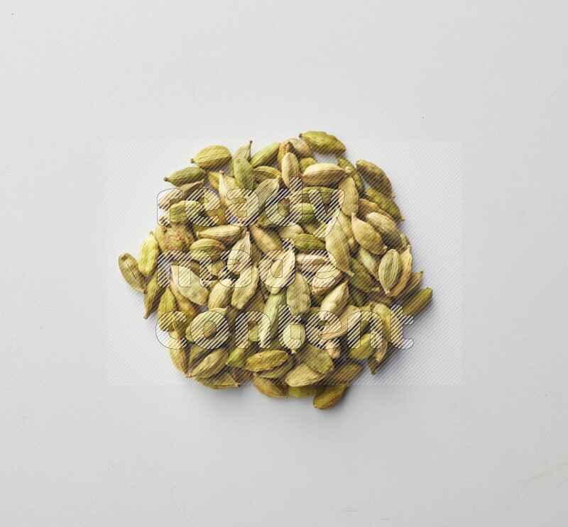 Top-view shot of Cardamon on white background