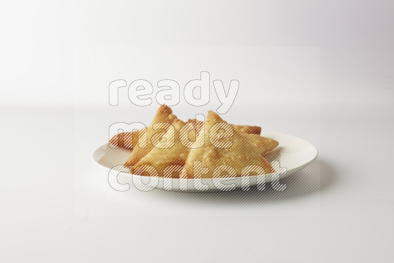 sambosas on a white background