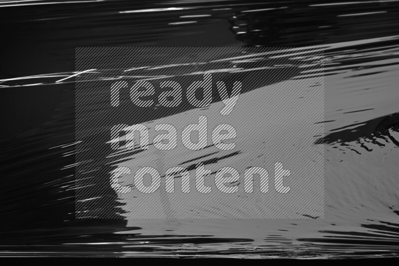 Plastic wrap texture on black background