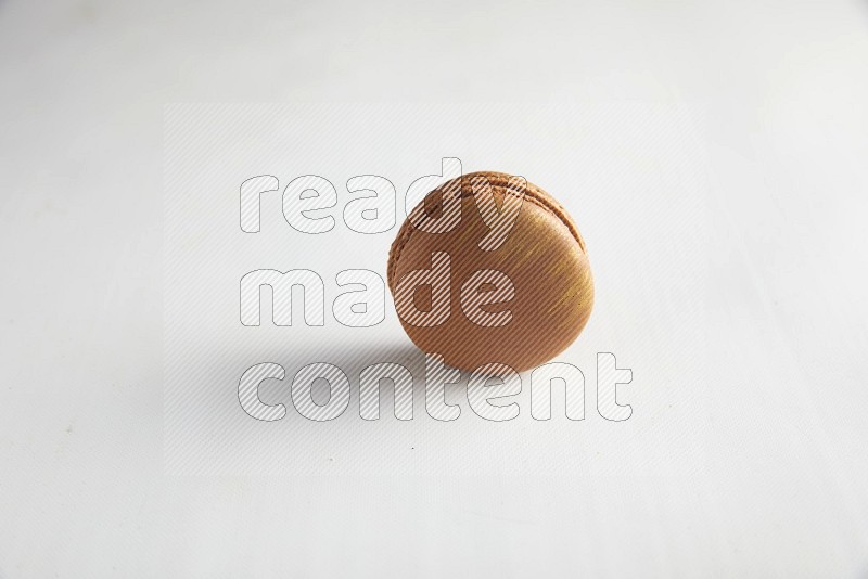 45º Shot of Brown Coffee macaron on white background