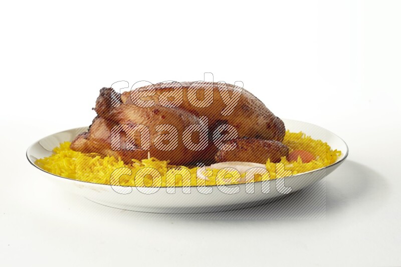 yellow  basmati Rice with kabsa chicken pieces on a white plate with a silver rim direct on white background