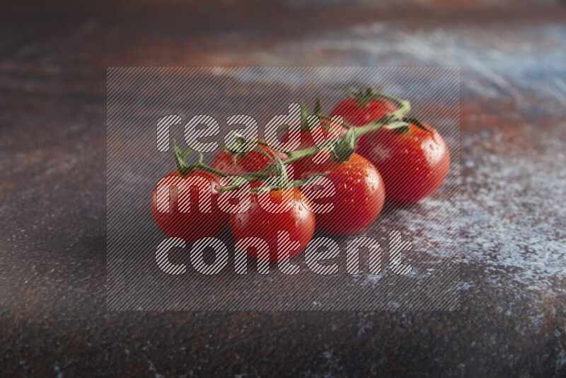 red cherry tomato vein on a reddish rustic metal background 45 degree