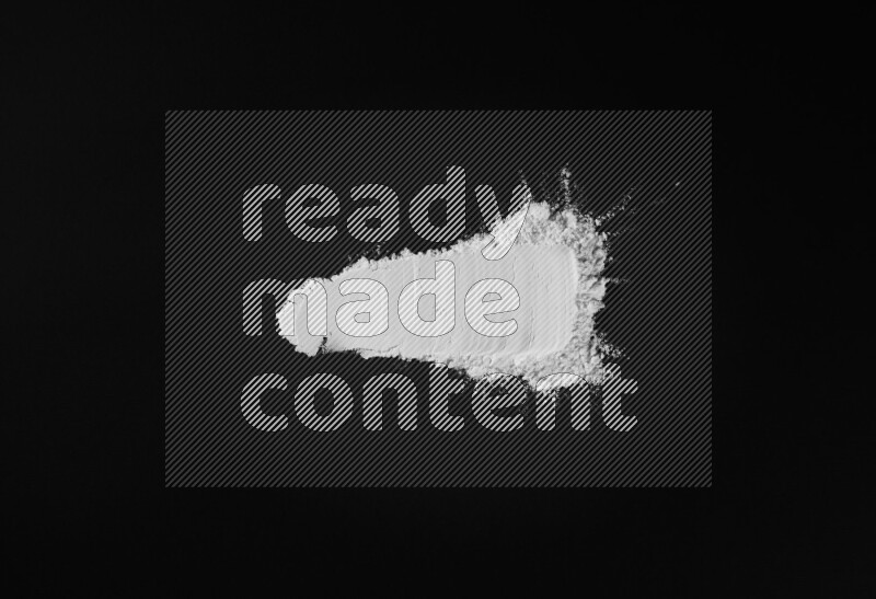 White powder strokes on black background